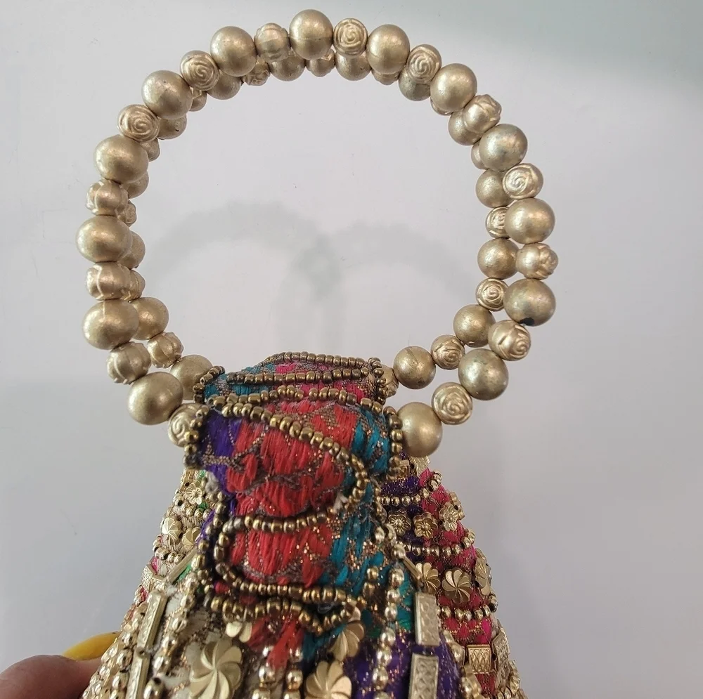 Multi-Colored Fortune Cookie Handbag With Gold Embellishments